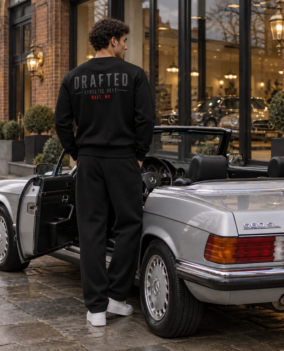 Black Drafted Brand sweatshirt with tonal black and red back graphics and loose black sweatpants