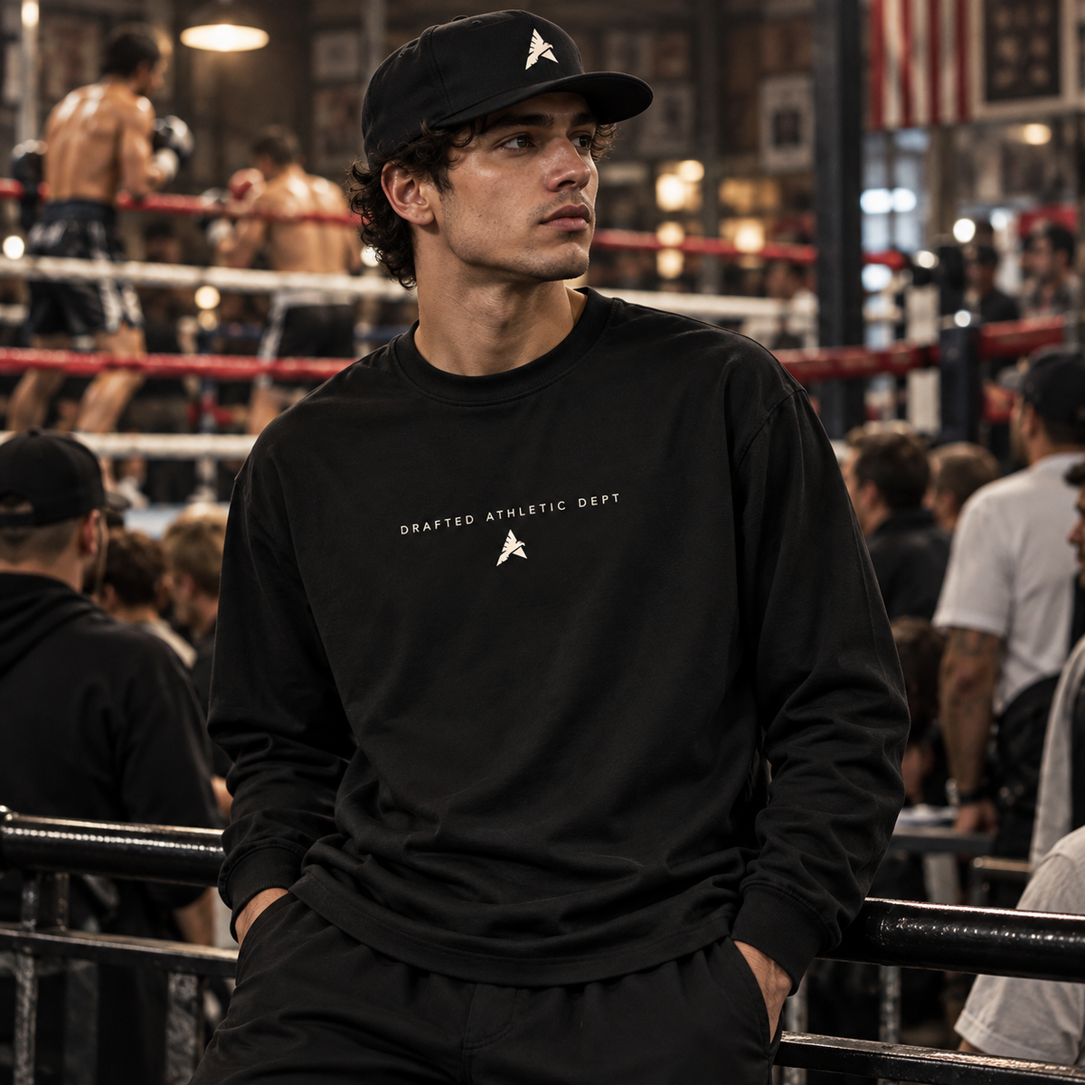 Black Victory shirt and Eagle A snapback at ringside front view